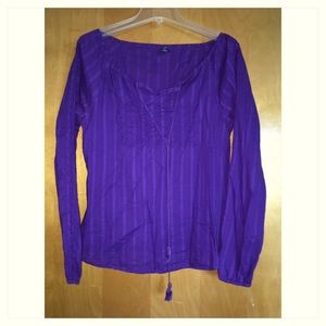 Purple cotton blouse.